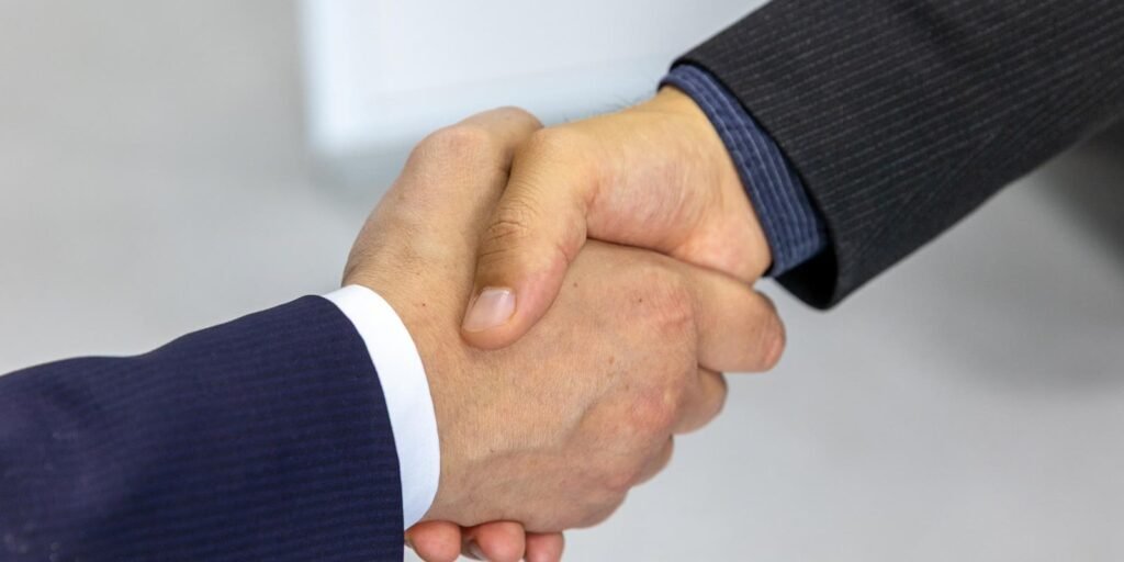 Professional handshake in a business meeting