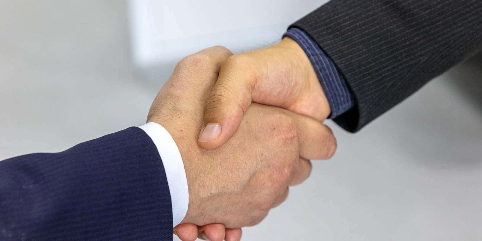 Professional handshake in a business meeting